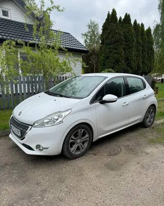 mazowieckie Peugeot 208 cena 23900 przebieg: 138000, rok produkcji 2012 z Swarzędz